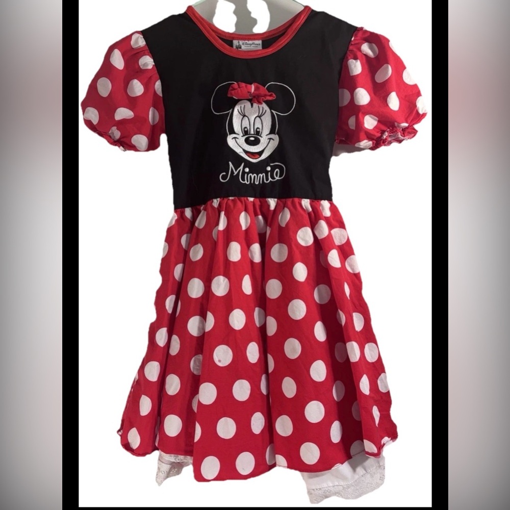 Vintage Disney Minnie Mouse red polka dot dress costume with puffy sleeves.